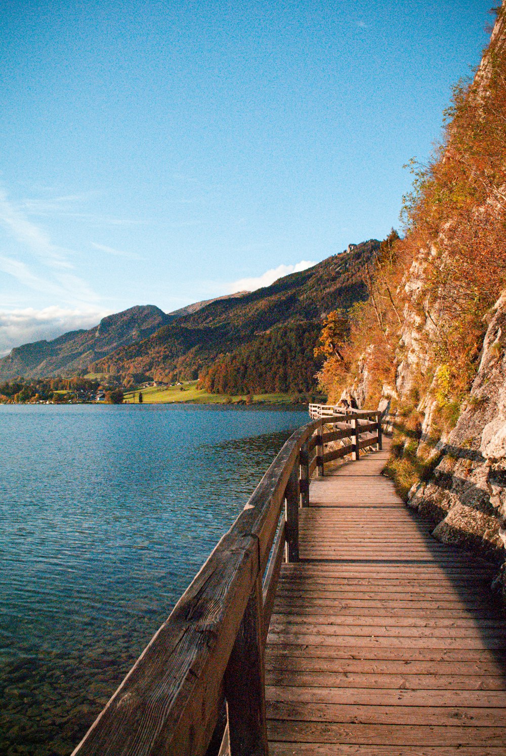 a wooden bridge over water