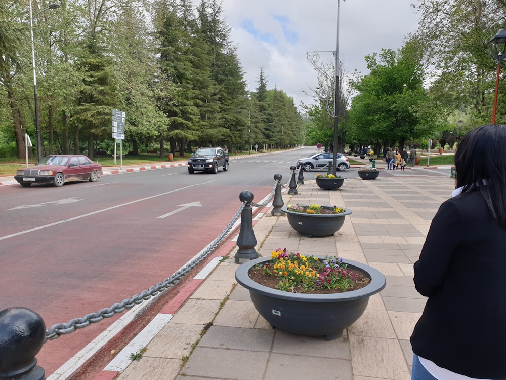 a street with cars and people on it