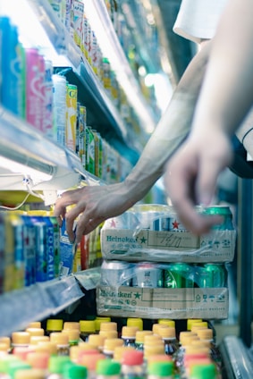 a person pushing a shopping cart