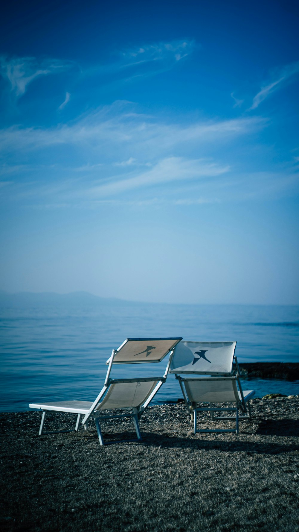 two chairs on a beach