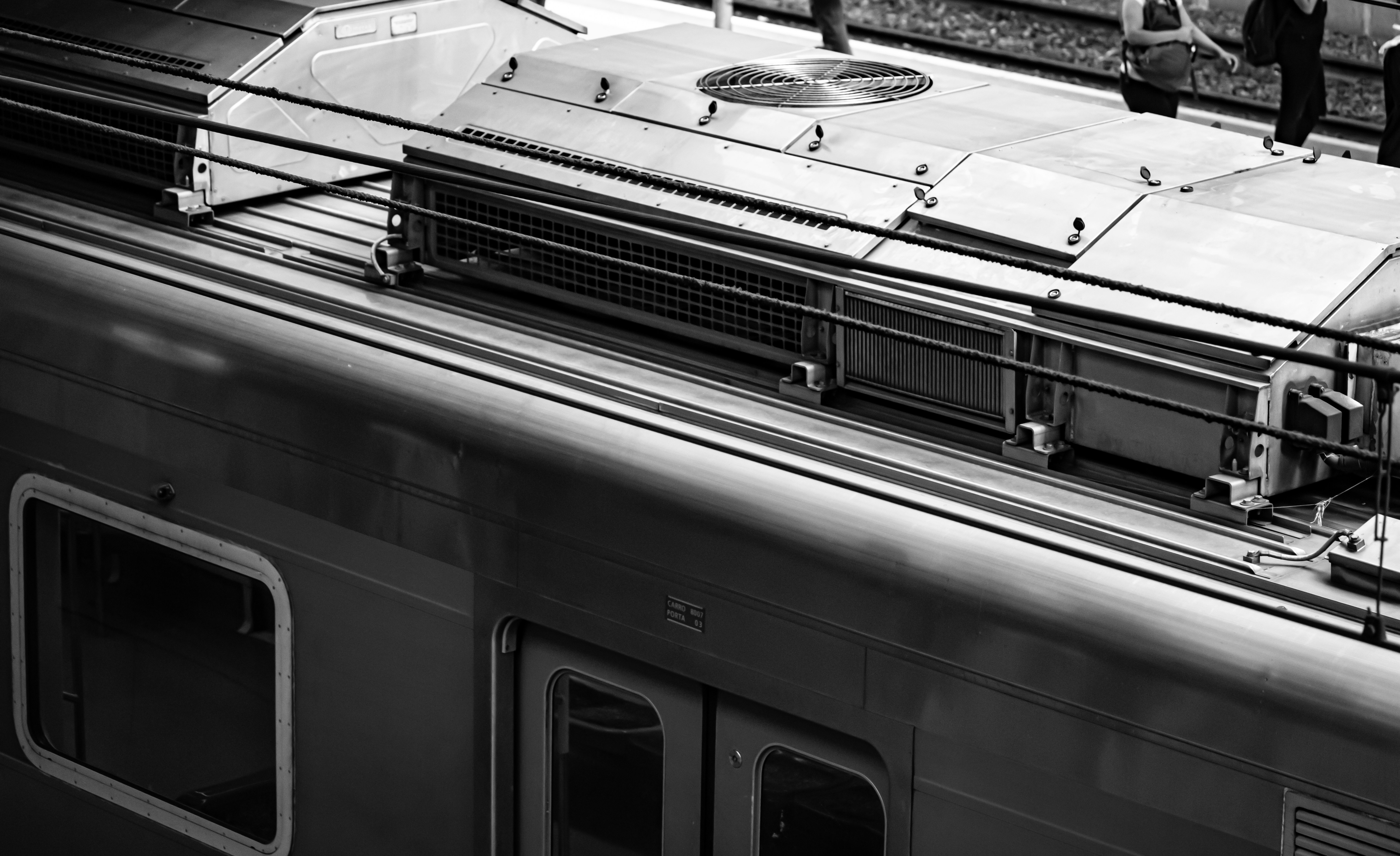 a train with a large metal railing