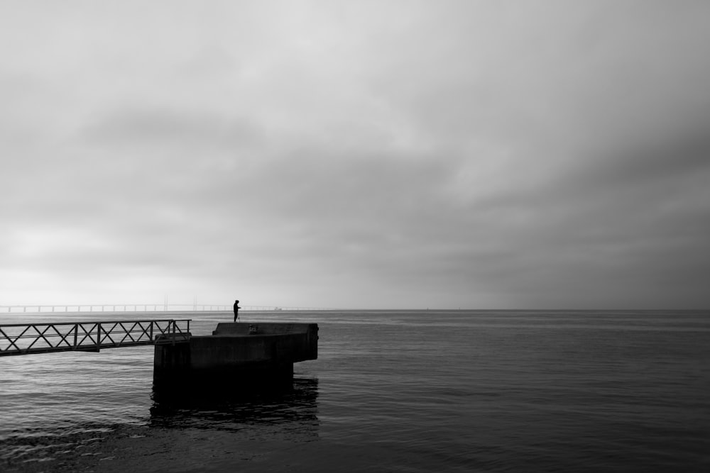 a person standing on a dock