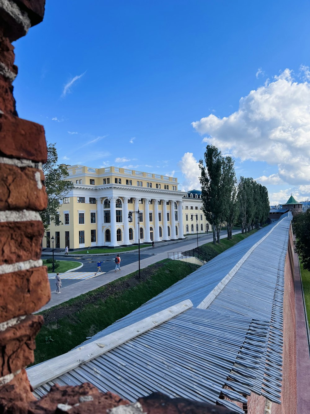 a long walkway leading to a building