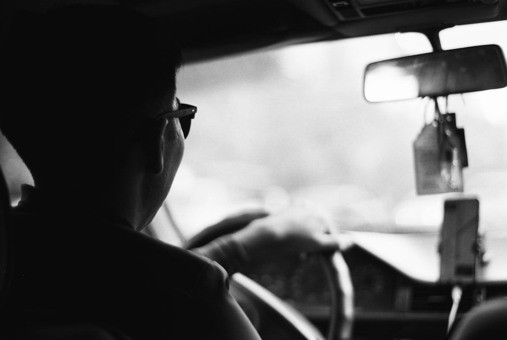 a man driving a car