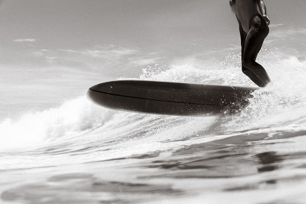 a person surfing on the waves