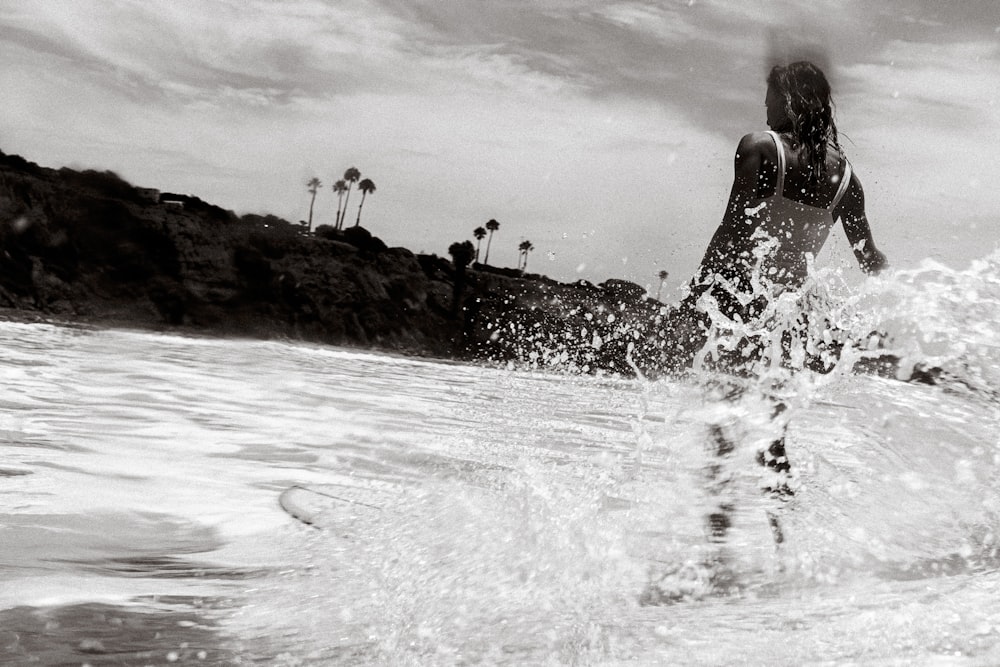 a man surfing on the waves