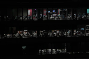 A nighttime office scene showing agents working diligently to provide 24/7 service.