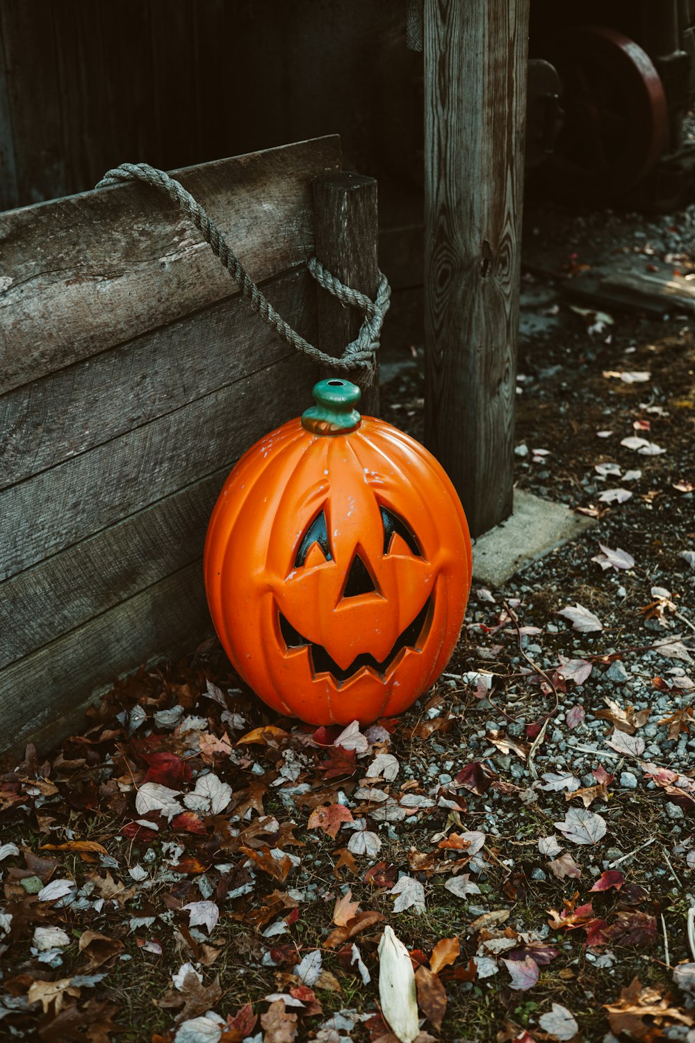 a pumpkin with a chain on it