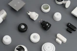 Smart home devices glowing softly in a cozy living room with mint and gray tones.