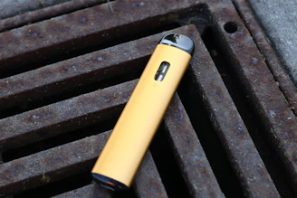 a yellow and black knife