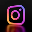 A glowing gradient camera icon with rounded corners against a black background