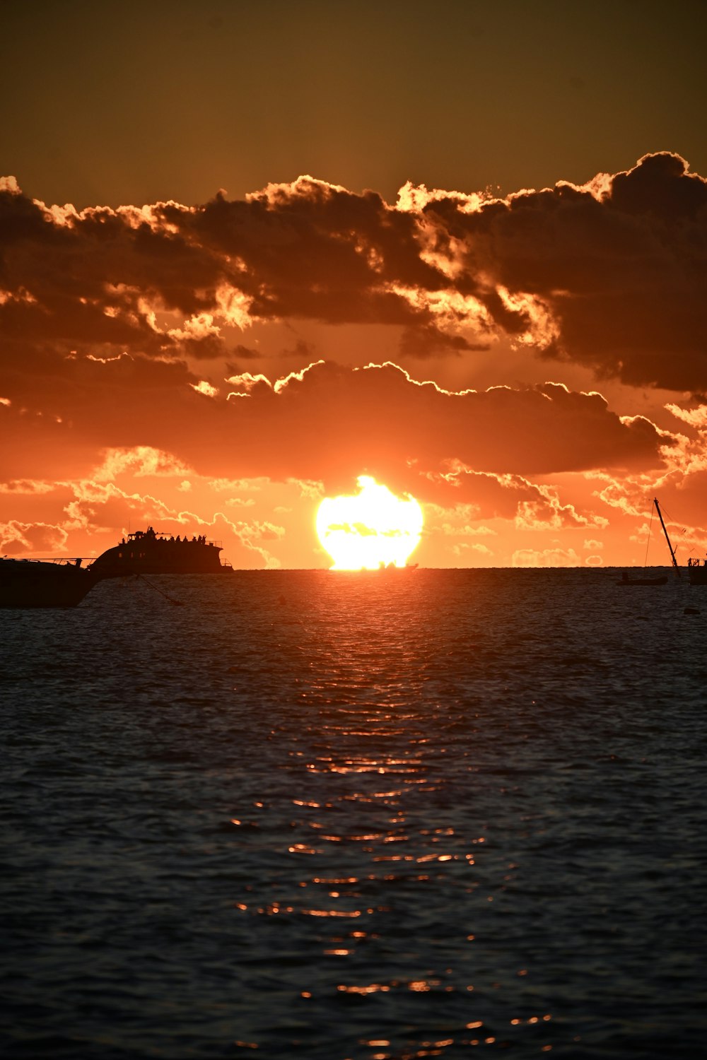 a sunset over a body of water