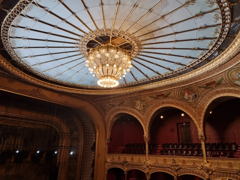 a chandelier from a ceiling in a building