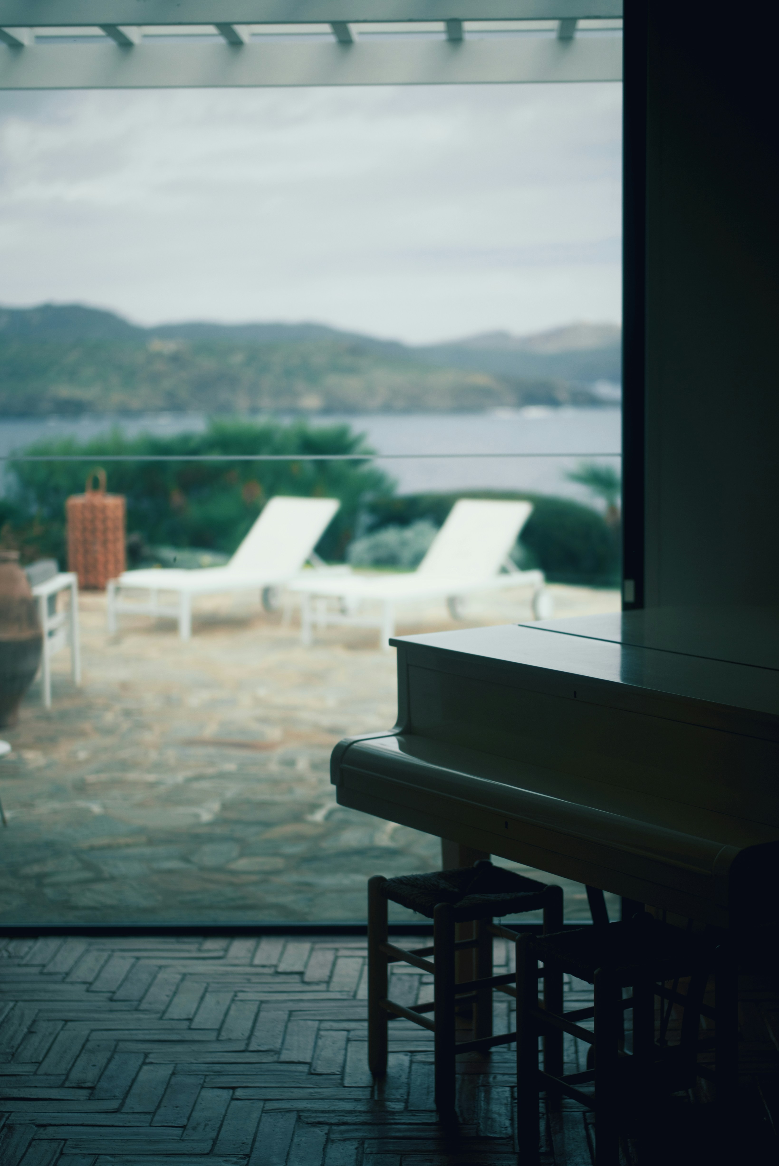 a table and chairs on a balcony