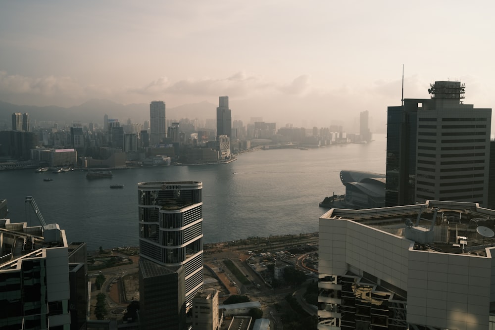 a city skyline with a river