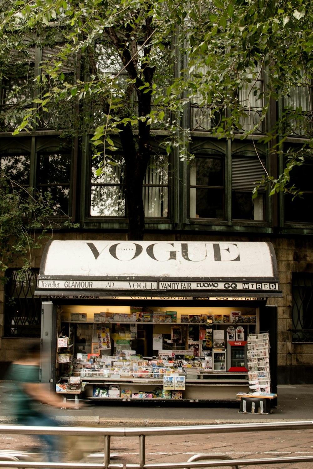 a store front with a sign