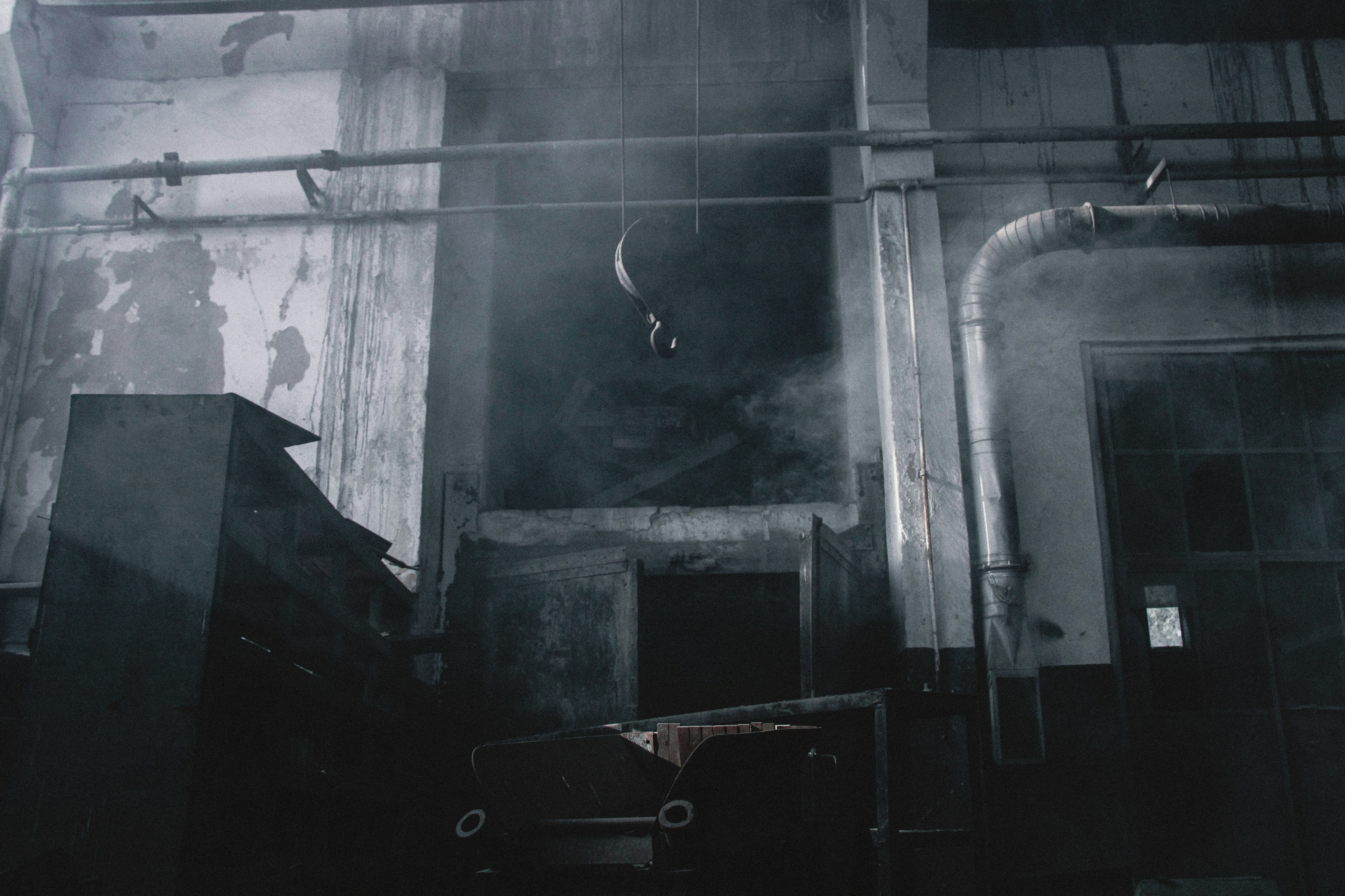 a room with pipes and a machine