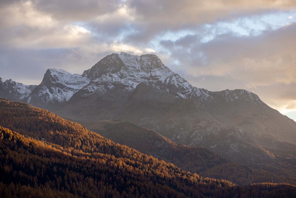 a mountain range with clouds