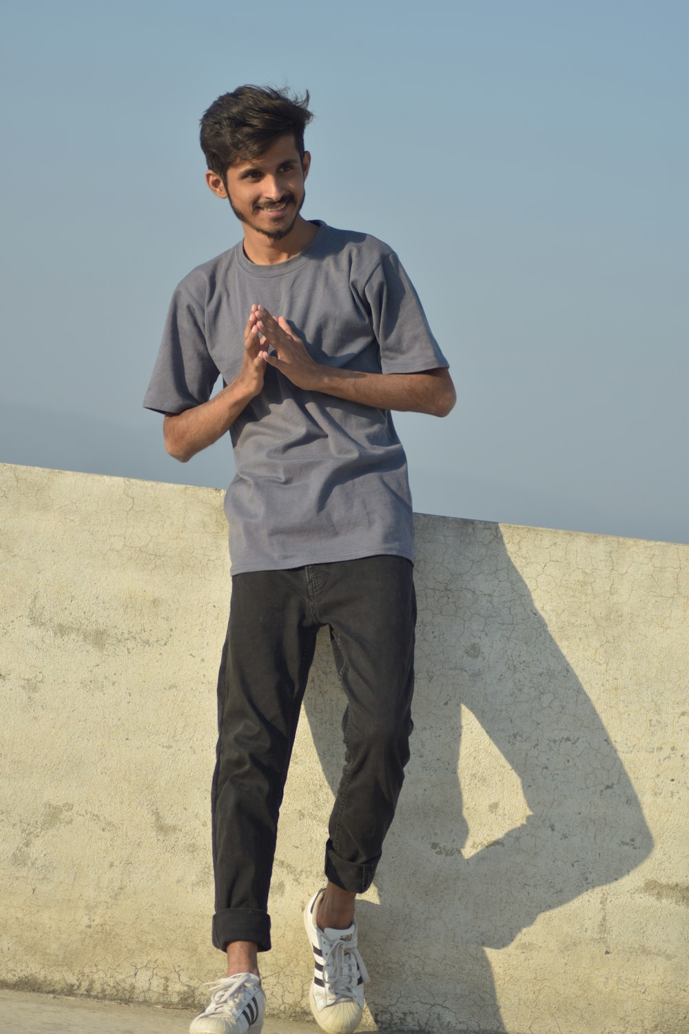 a man standing on a road