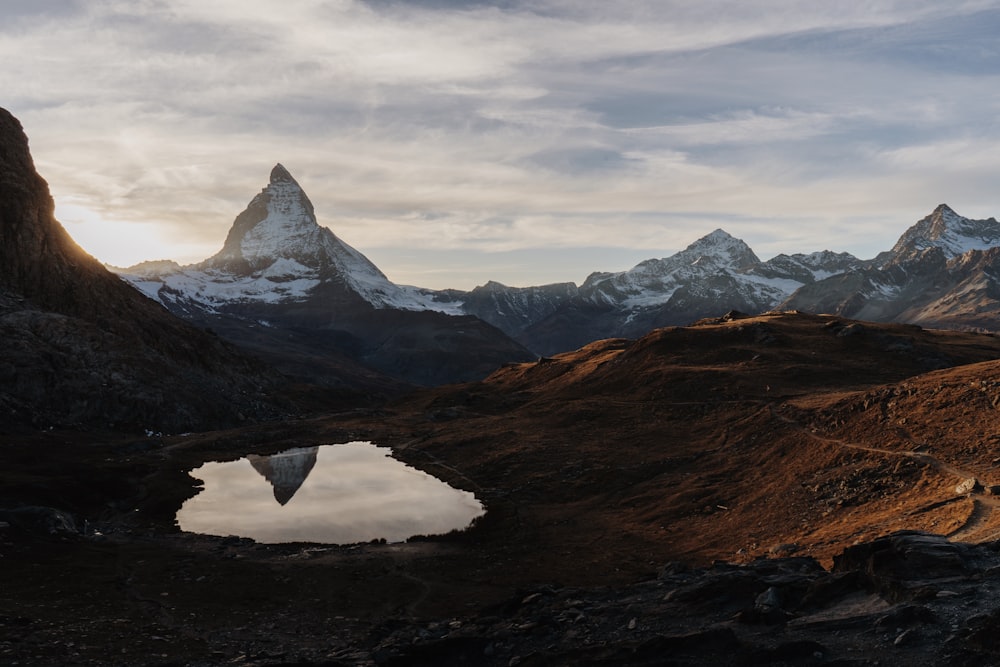 a lake surrounded by mountains