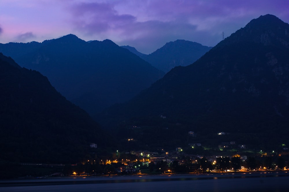 a city in front of mountains