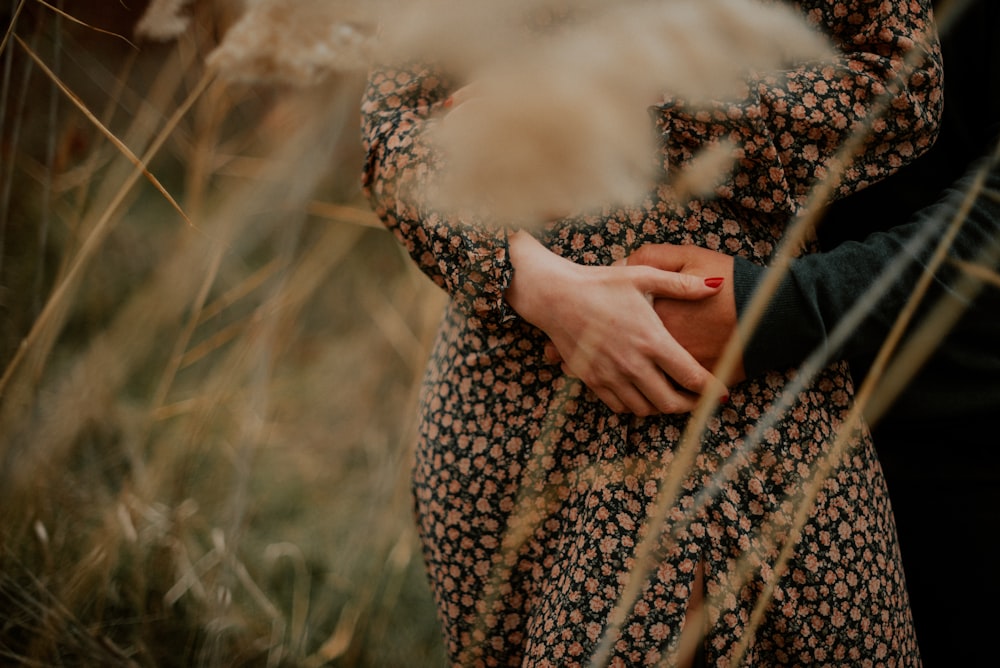 a person holding the hand over the face