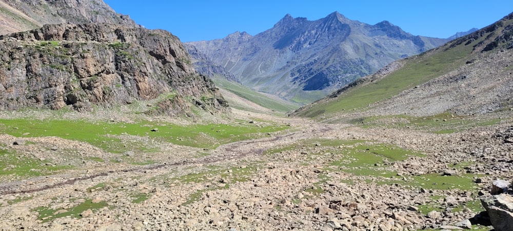 a rocky valley between mountains