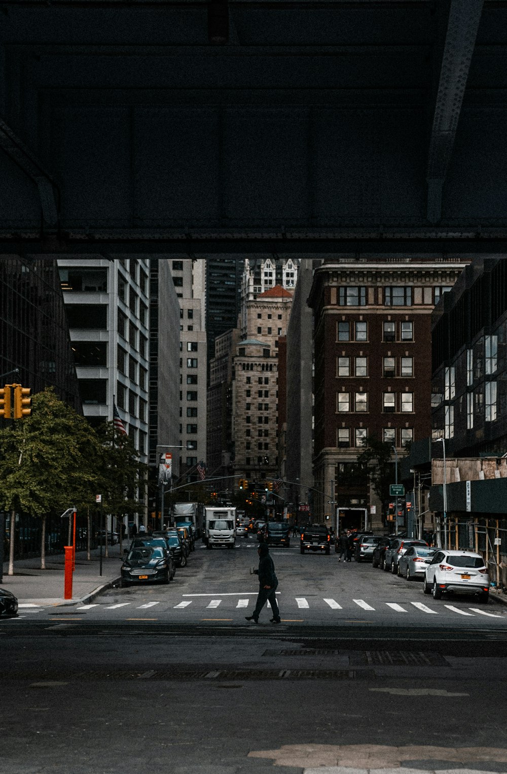 a person walking across a crosswalk