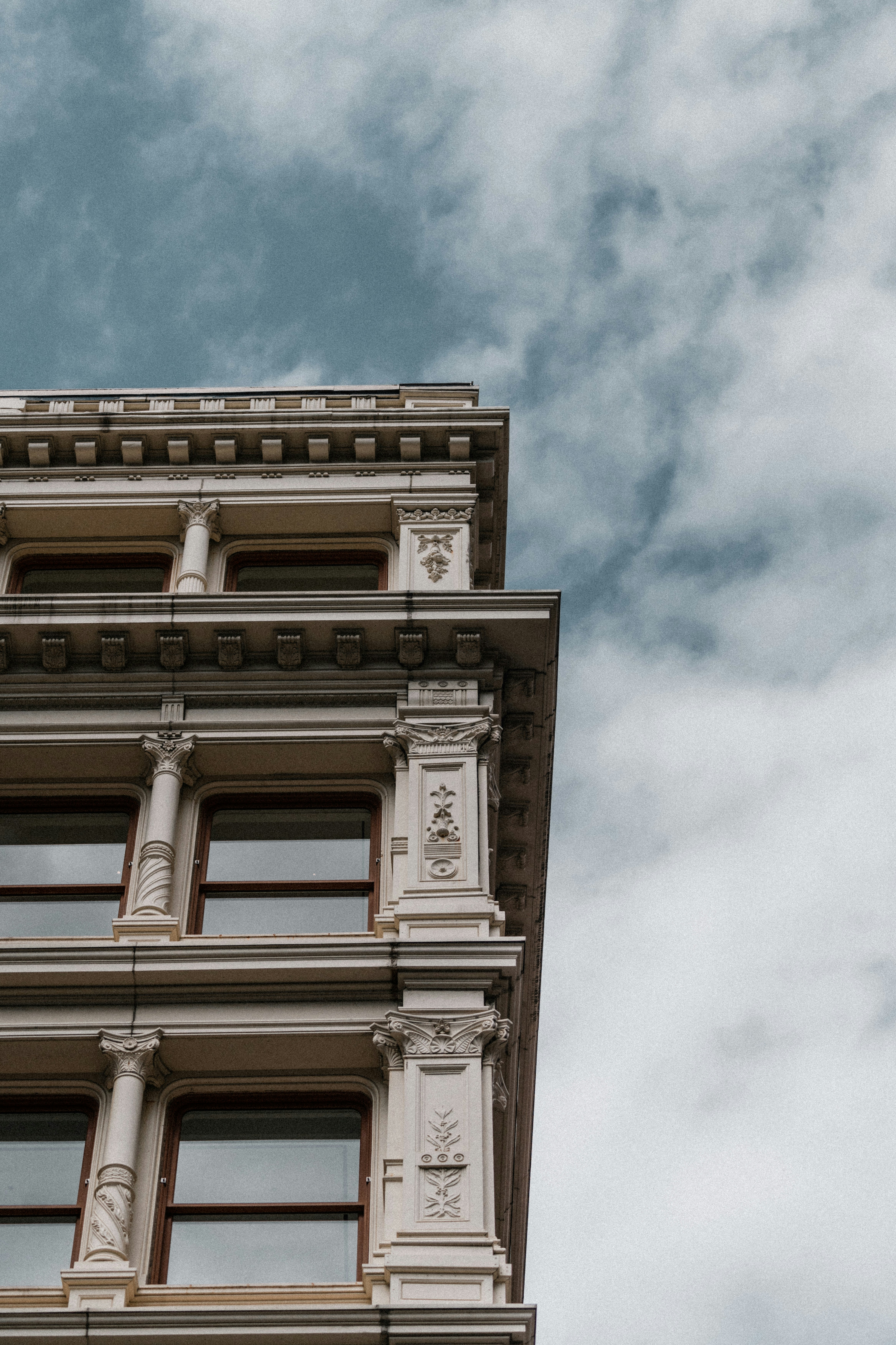 a building with a cloudy sky