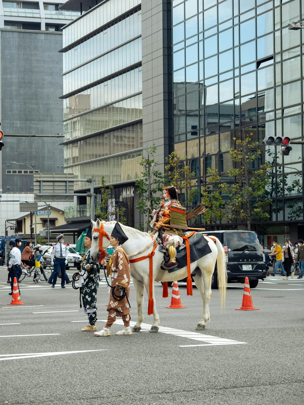 a couple of men riding horses