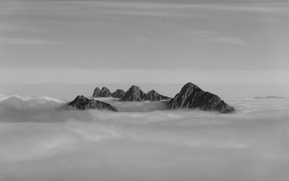 a mountain in the clouds