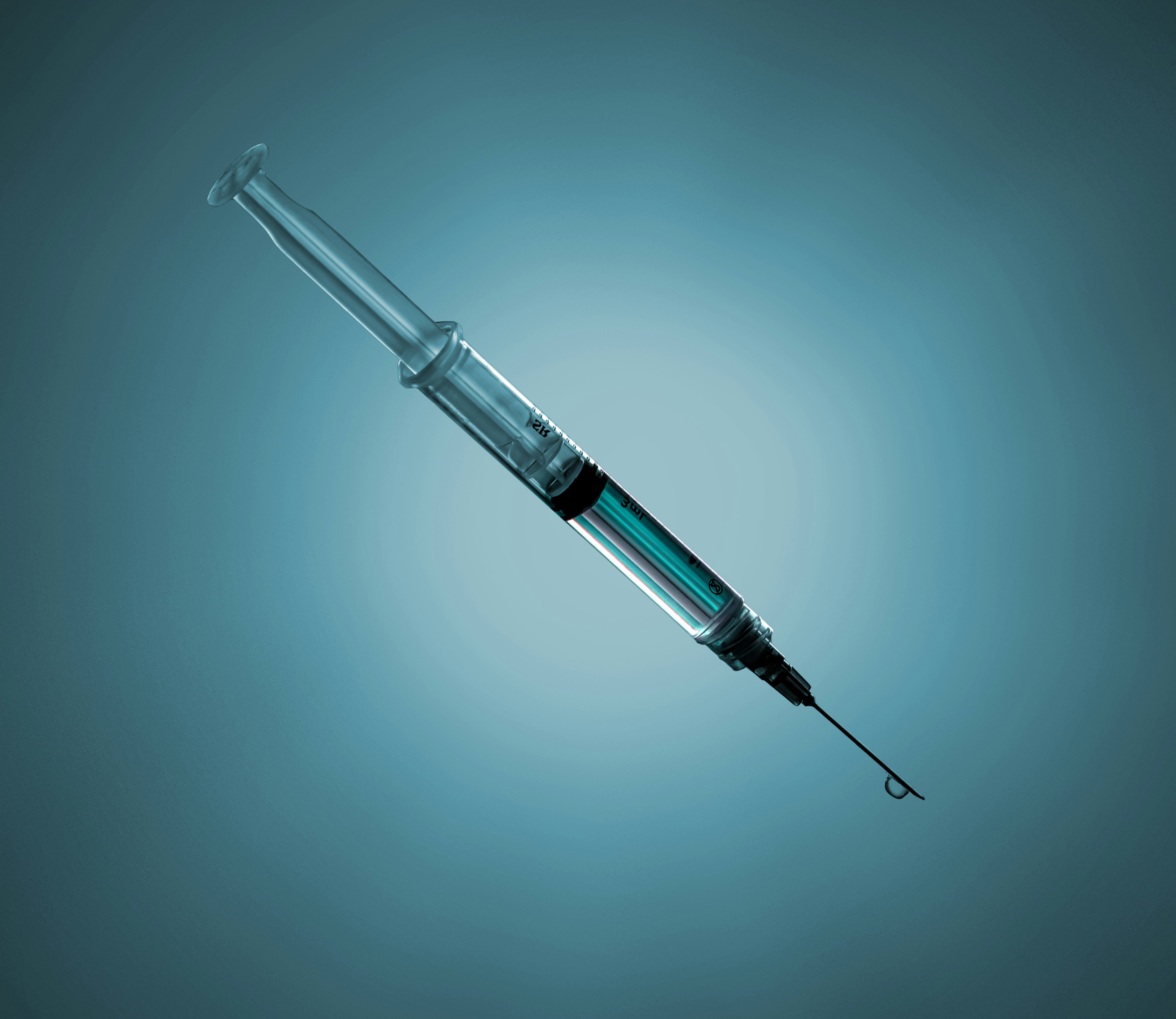 a close-up of a syringe