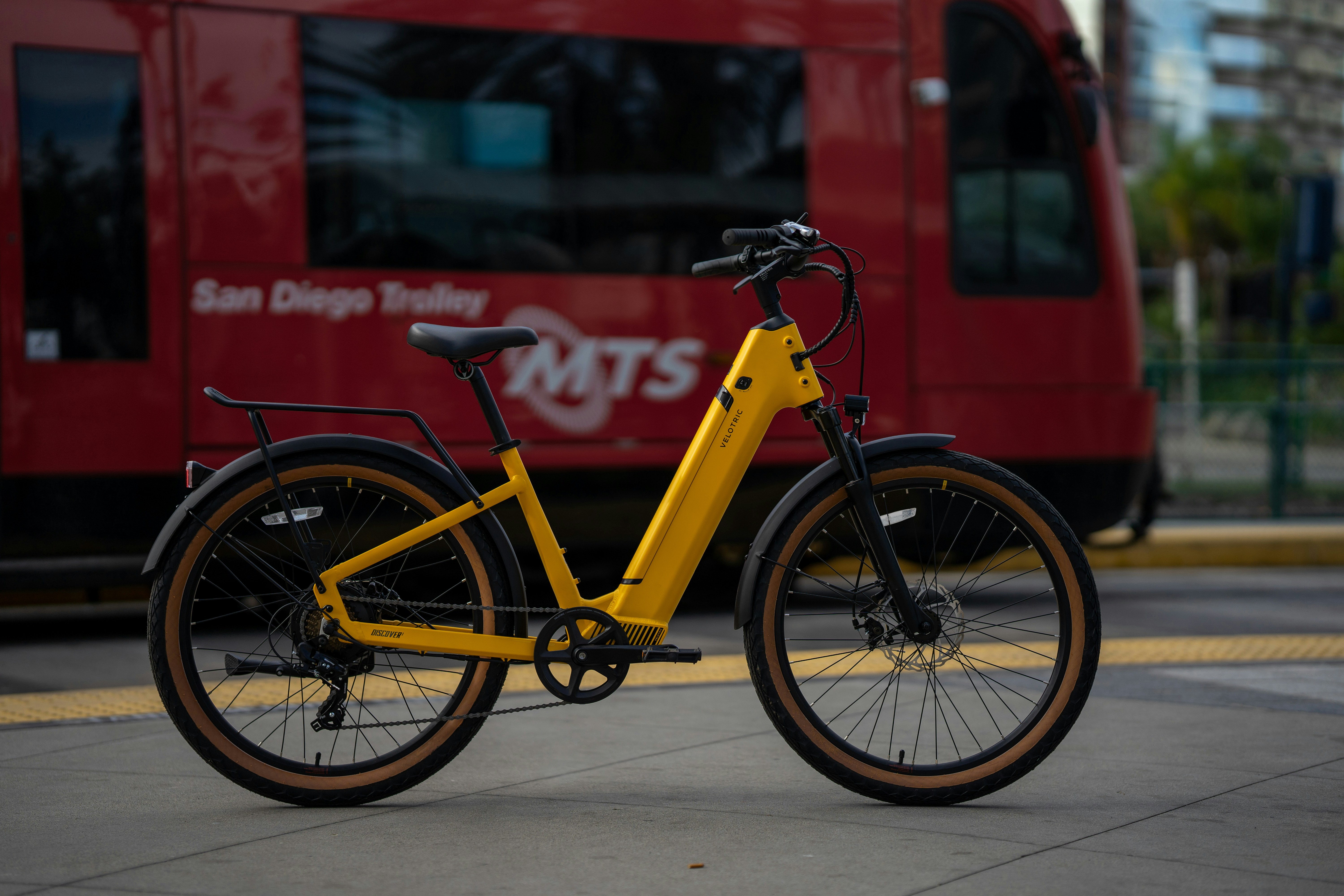 a bicycle parked on the side of a street