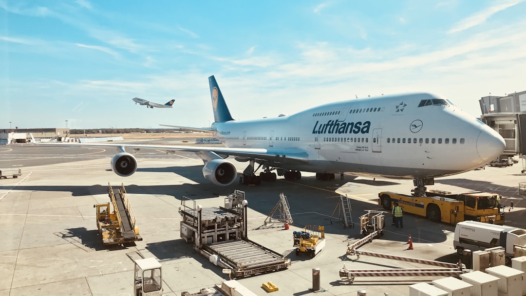 a large airplane is parked at an airport, Frankfurt Airport