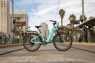 a bicycle parked on a sidewalk