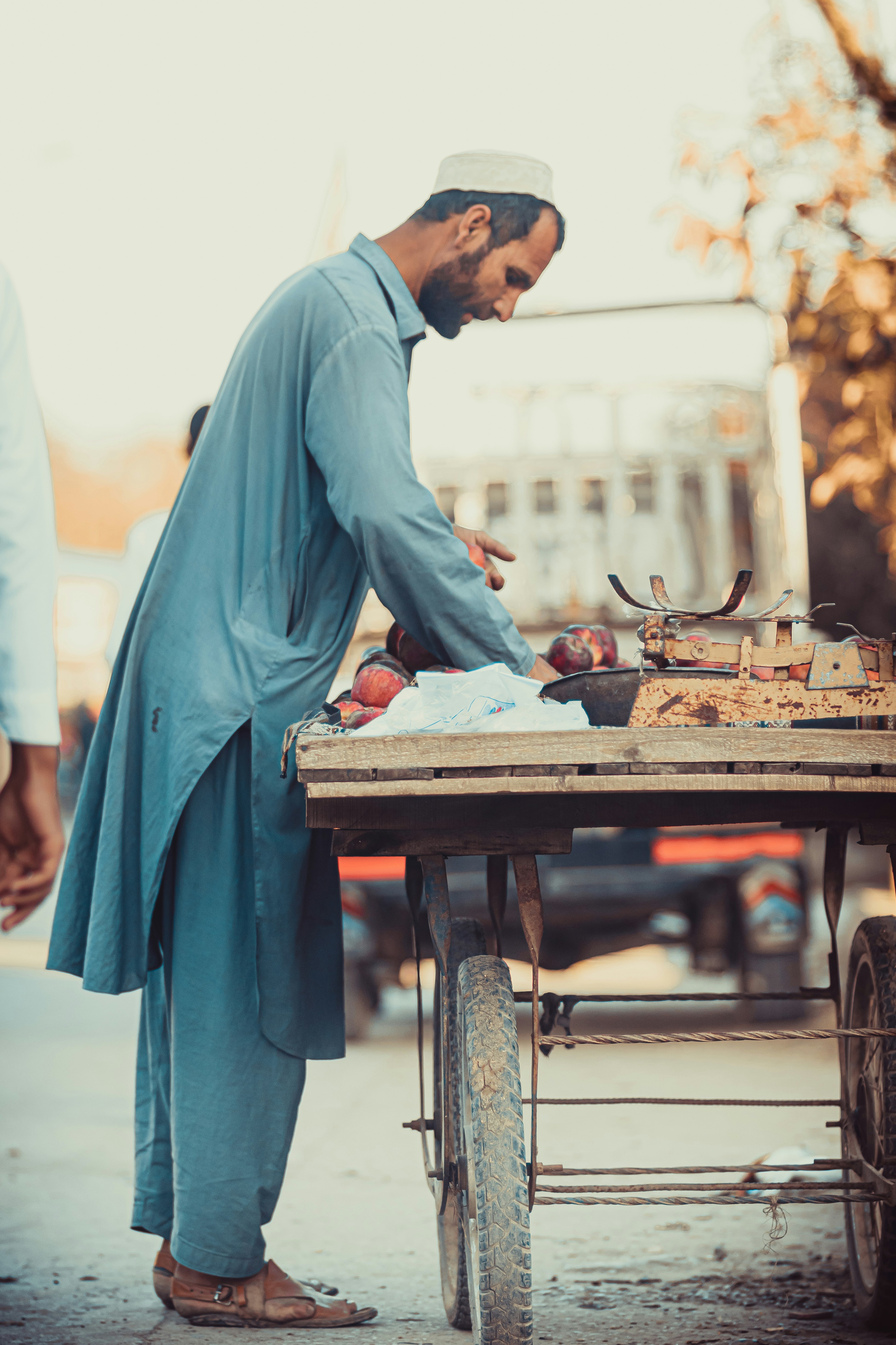 a man cooking food on a grill