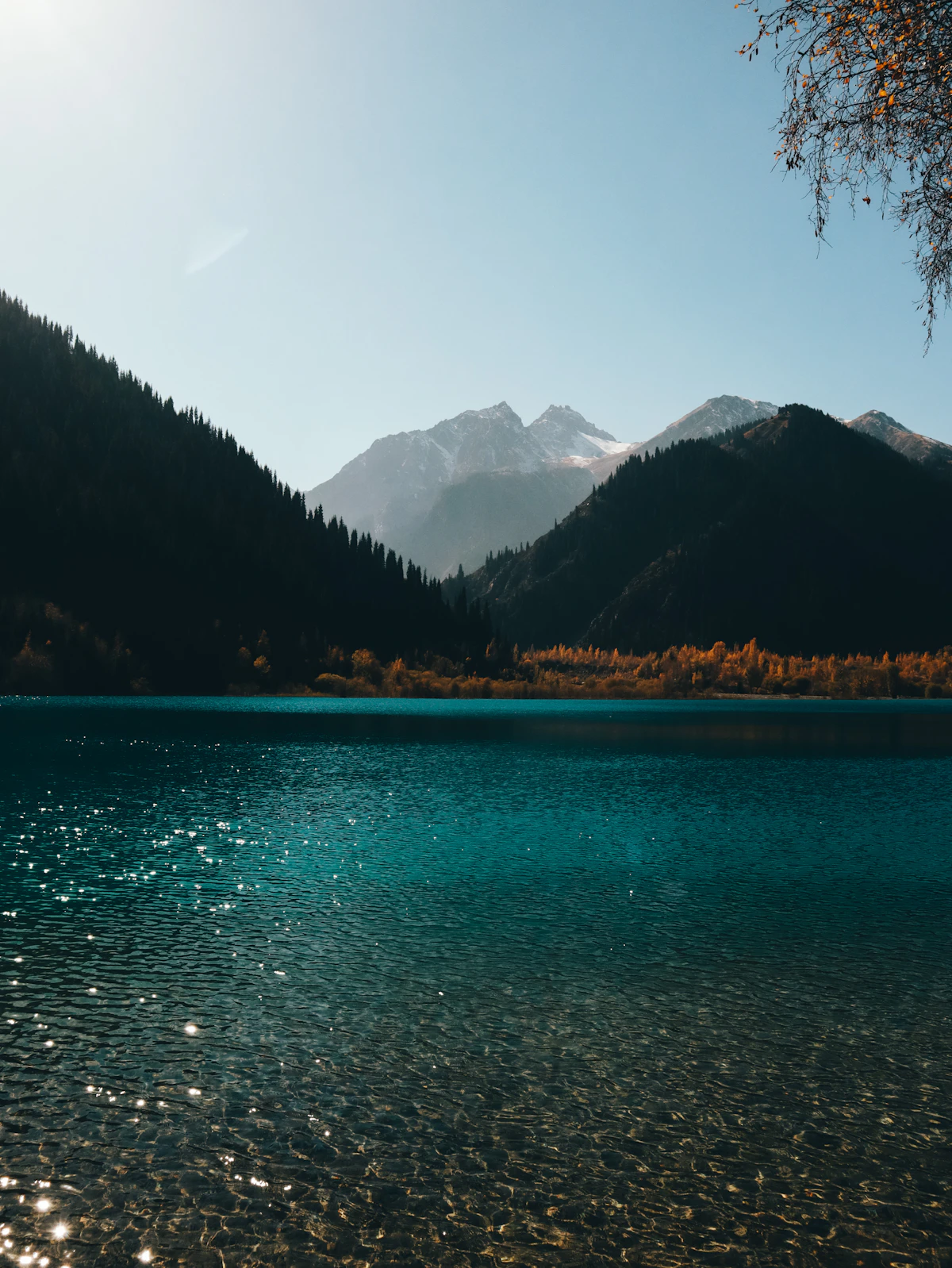 Alpine lake surrounded by autumn mountains near Almaty, Kazakhstan