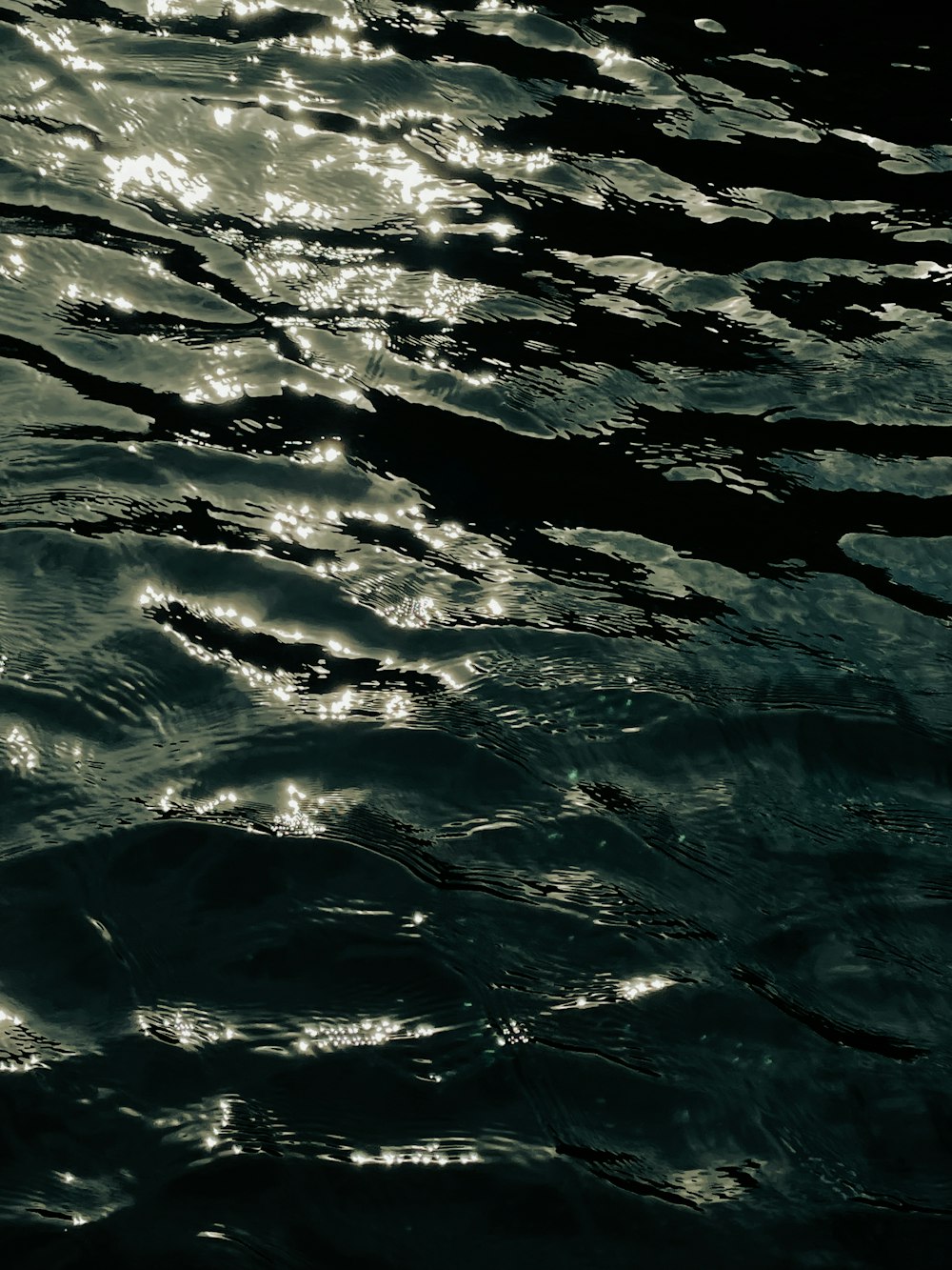 a body of water with ripples