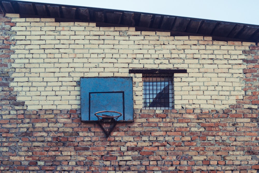 a brick wall with windows