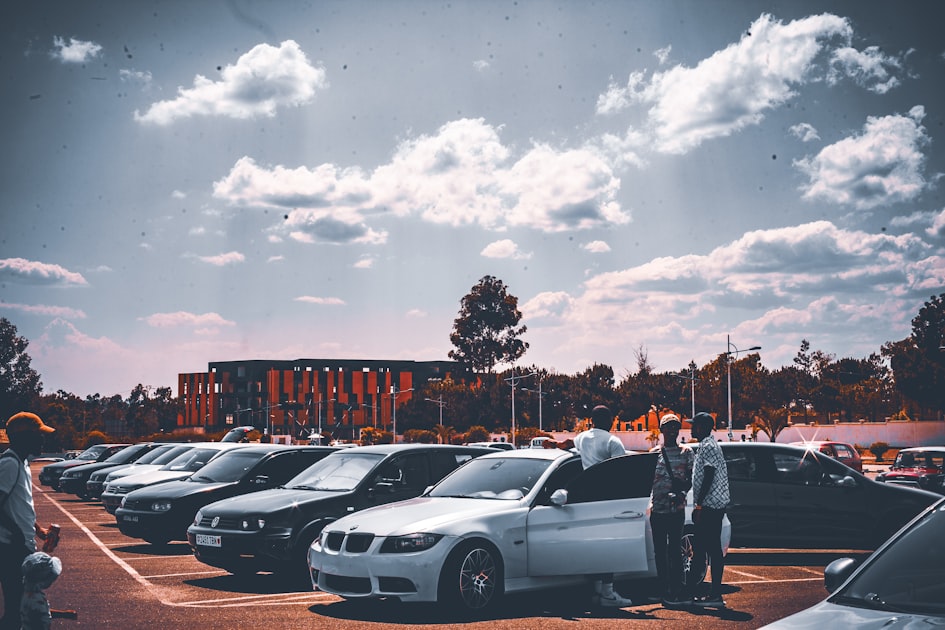 a group of cars parked in a parking lot