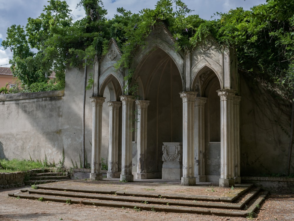 a stone building with pillars