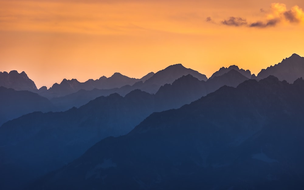 a view of mountains and the sky