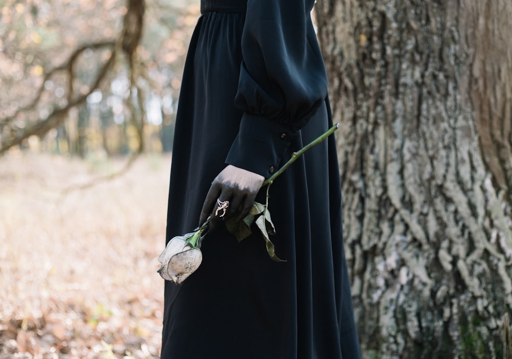 a person holding flowers