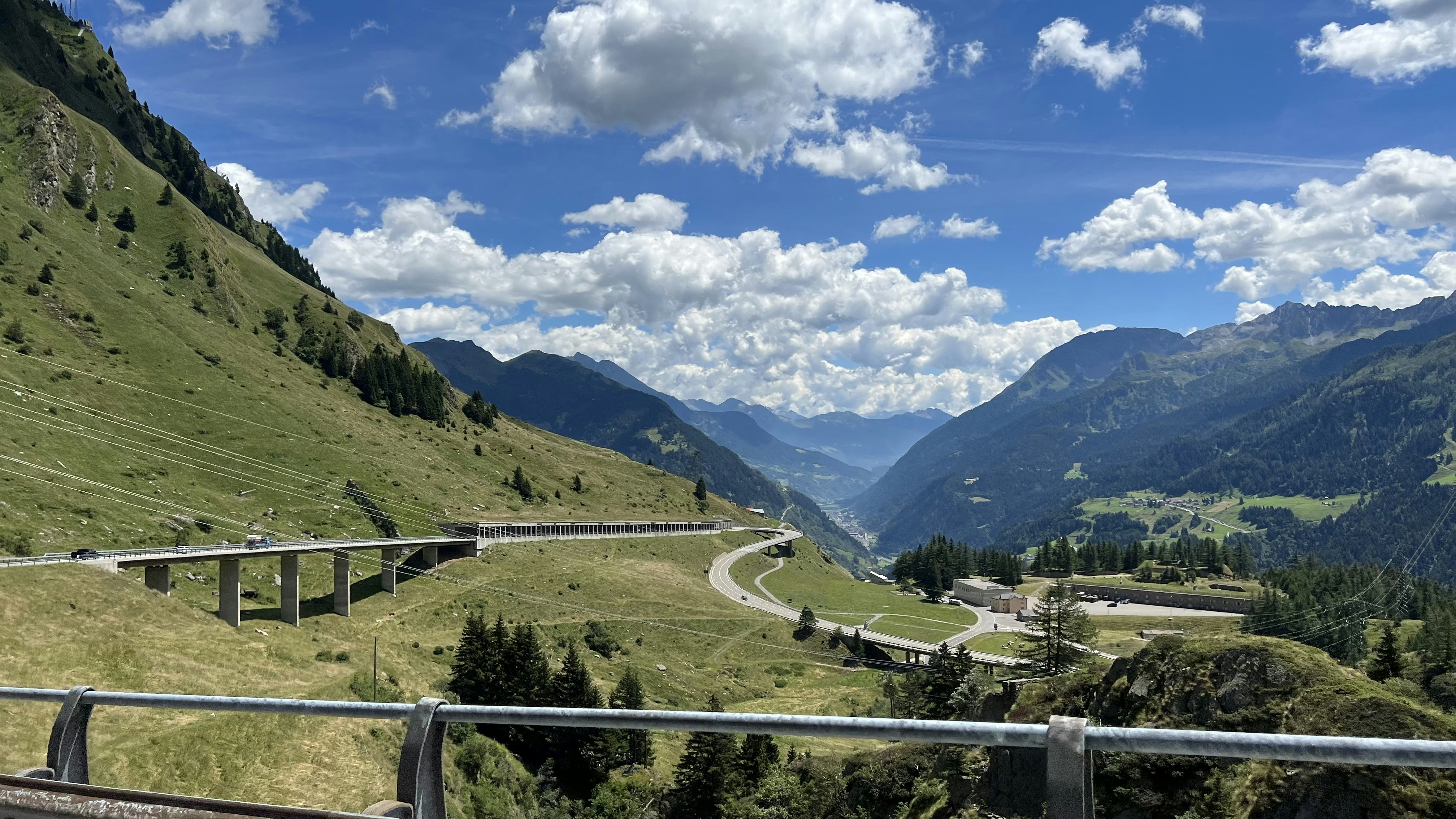a road going through a valley, Driving through Switzerland