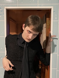 a man with his hands up