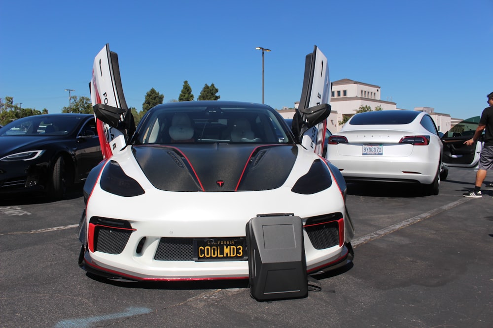 a white car with doors open