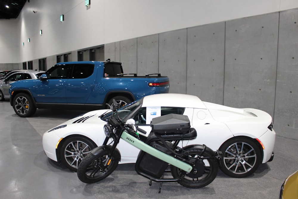 a motorcycle parked next to a car