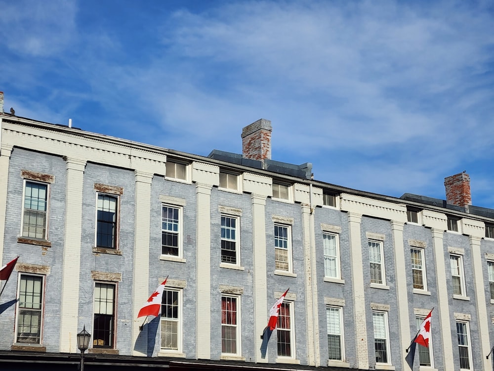 a building with flags in front of it