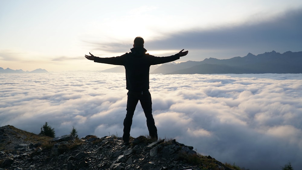 a man standing on a mountain