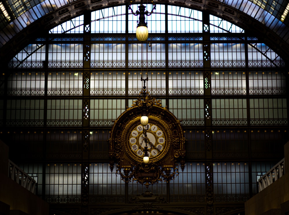 a large clock in a large building